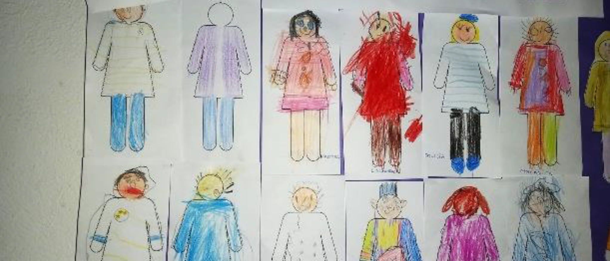 Ilustraciones de mujeres con trajes asociados al género masculino hechos por alumnado de infantil